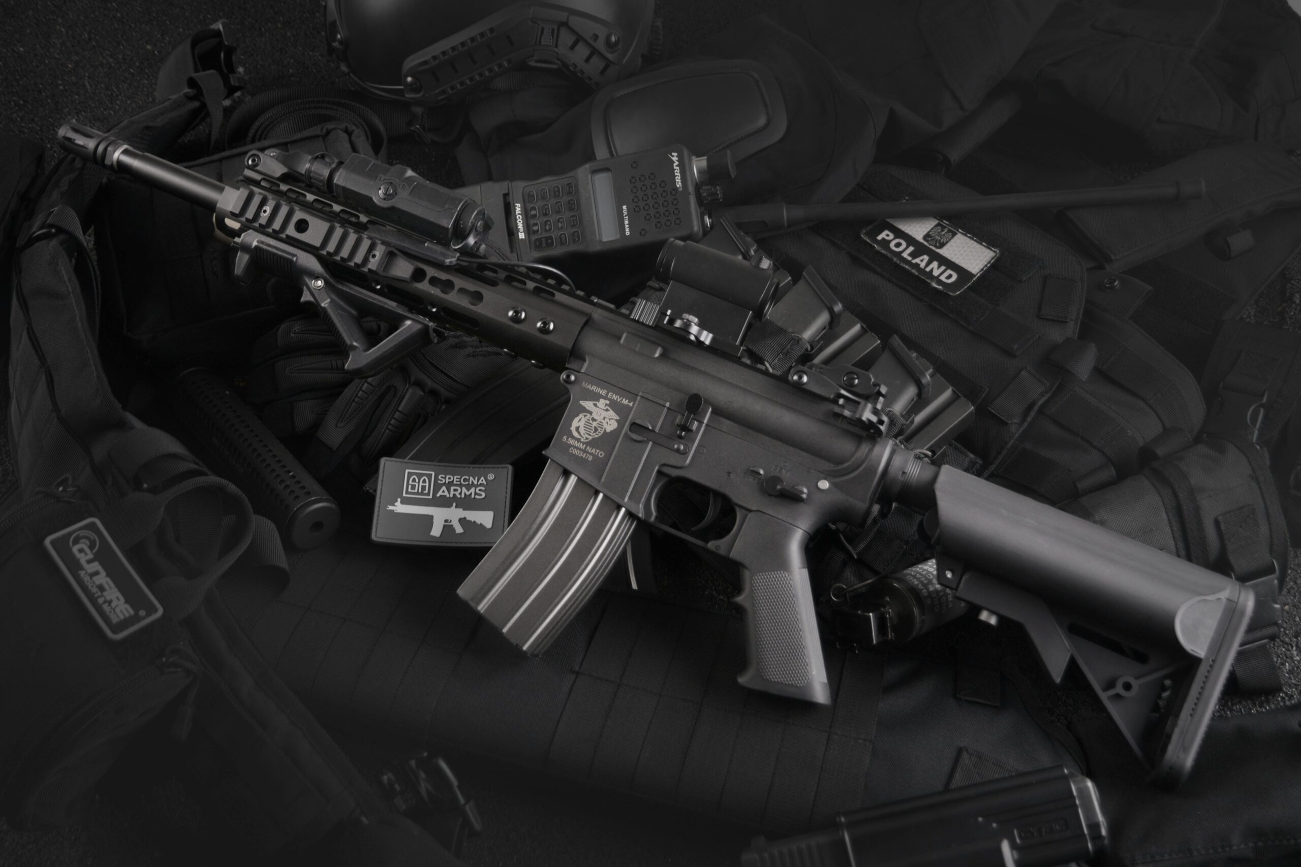 Detailed view of military rifles and tactical equipment, showcasing precision.